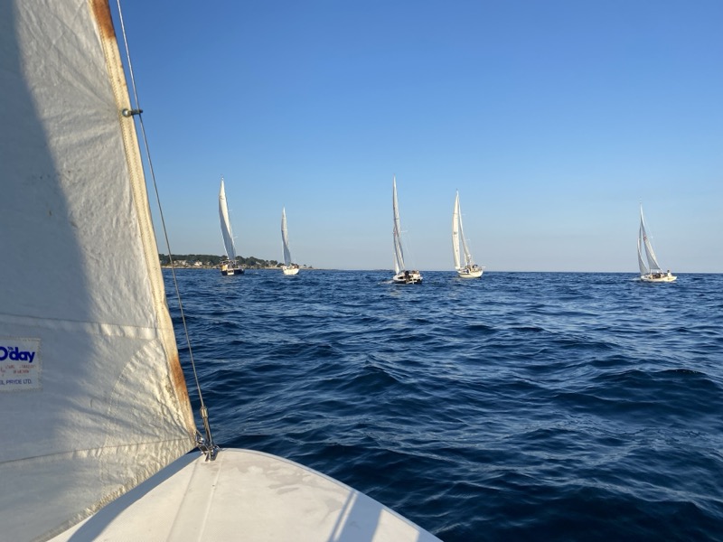 Sailboats on the water at sunset